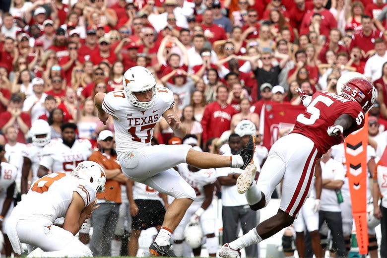 DALLAS, TX - OCTOBER 06: Cameron Dicker #17 of the Texas Longhorns kicks the game winning field goal against the Oklahoma Sooners in the 2018 AT&T Red River Showdown at Cotton Bowl on October 6, 2018 in Dallas, Texas. (Photo by Ronald Martinez/Getty Images)